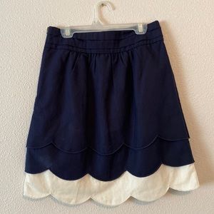 High waisted dark blue and cream skirt with side zipper. Brand: Floreat, size 0